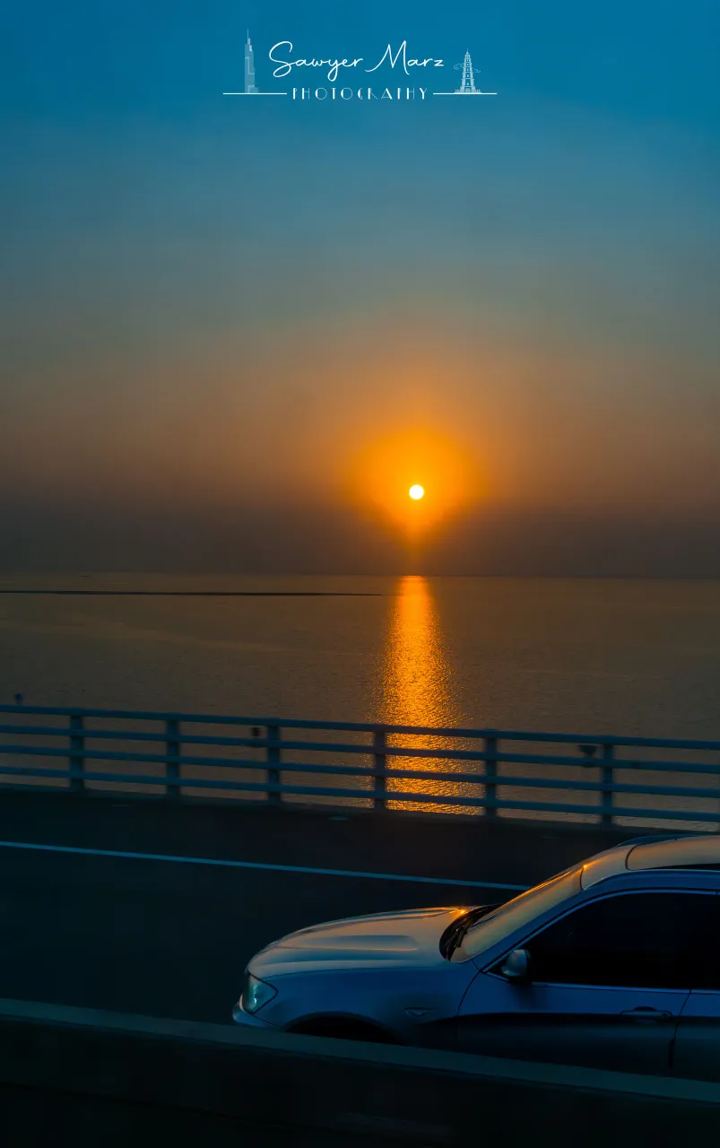 S9 驶过石臼湖，日落追着一辆车